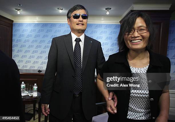 With the help of his wife Yuan Weijing , blind Chinese lawyer and human rights activist and senior fellow in human rights at the Witherspoon...