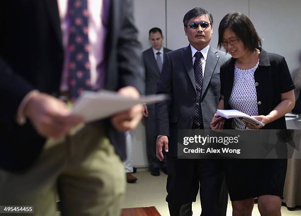 With the help of his wife Yuan Weijing , blind Chinese lawyer and human rights activist and senior fellow in human rights at the Witherspoon...