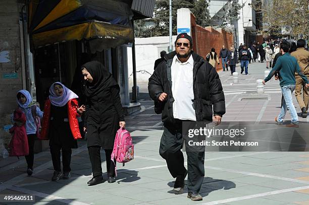 Dawud Salahuddin, an African-American convert to Islam who was born David Theodore Belfield , walks along ValiAsr Street on March 16 in Tehran, Iran....