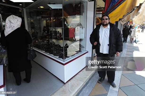 Dawud Salahuddin, an African-American convert to Islam who was born David Theodore Belfield , walks along ValiAsr Street on March 16 in Tehran, Iran....
