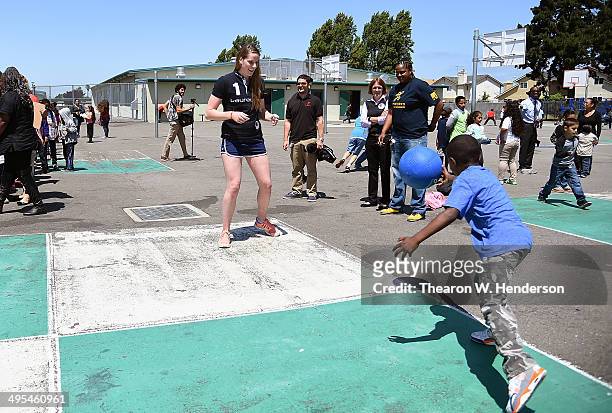 Winner of the Laureus World Sports Award for a female athlete and four-time Olympic gold medalist Missy Franklin plays fourquare with studends at...