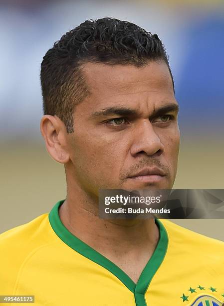 Daniel Alves of Brazil looks on during the International Friendly Match between Brazil and Panama at Serra Dourada Stadium on June 03, 2014 in...