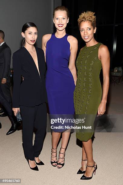 Designers Carly Cushnie and Michelle Ochs of Cushnie et Ochs pose with model Toni Garnn at the 12th annual CFDA/Vogue Fashion Fund Awards at Spring...