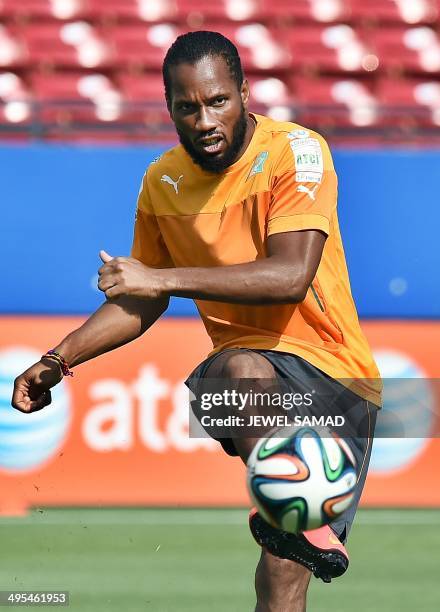 Ivory Coast's forward Didier Drogba kicks a ball during a training session at the Toyota Stadium in Frisco, Texas, on June 3 on the eve of their...
