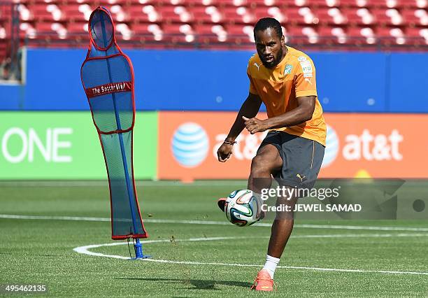 Ivory Coast's forward Didier Drogba kicks the ball during a training session at the Toyota Stadium in Frisco, Texas, on June 3 on the eve of their...