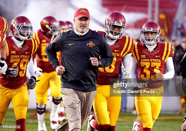 Head coach Paul Rhoads of the Iowa State Cyclones takes the field with his team before game action against the Texas Longhorns at Jack Trice Stadium...