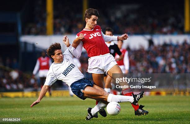 Spurs player Gary Mabbutt challenges Arsenal striker Alan Smith during a League Division One match between Tottenham Hotspur and Arsenal at White...