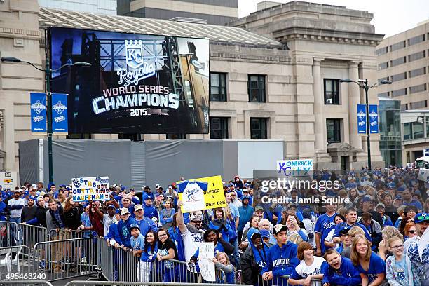 Fans cheer during a parade and celebration in honor of the Kansas City Royals' World Series win on November 3, 2015 in Kansas City, Missouri.