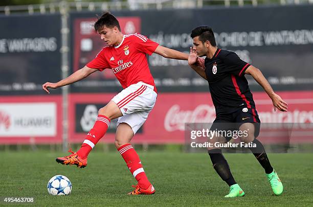 Benfica's forward Oliver Sarkic with Galatasaray ASÕ defender Yusuf Turkmen in action during the UEFA Youth League match between SL Benfica and...