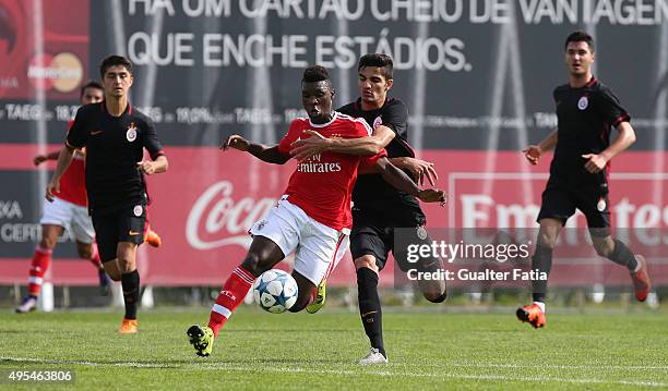 Benfica's defender Aurelio Buta with Galatasaray ASÕ defender Ahmet Demir in action during the UEFA Youth League match between SL Benfica and...
