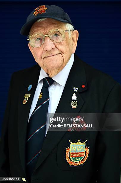 Day veteran and Chairman of the Southend branch of Normandy Veterans, Don Sheppard, poses for pictures in Basildon, Essex on June 3, 2014 before...