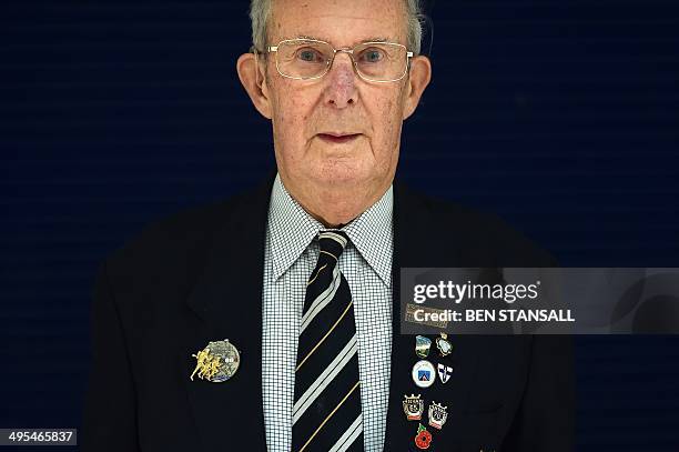 Veteran with the 29th Infantry Division, Jeffrey Lee, poses for pictures in Basildon, Essex on June 3, 2014 before embarking on a trip to France to...