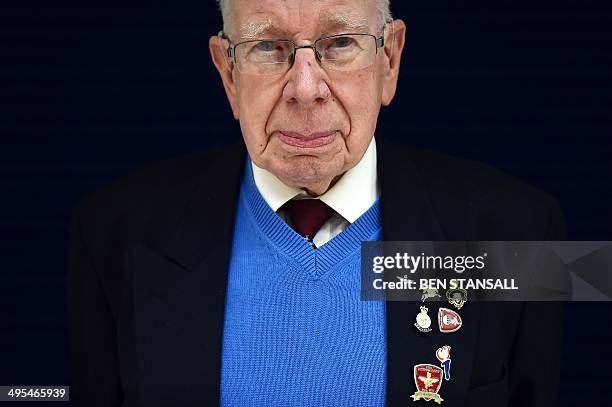 Arnhem veteran, David Whiteman, poses for pictures in Basildon, Essex on June 3, 2014 before embarking on a trip to France to commemorate the 70th...