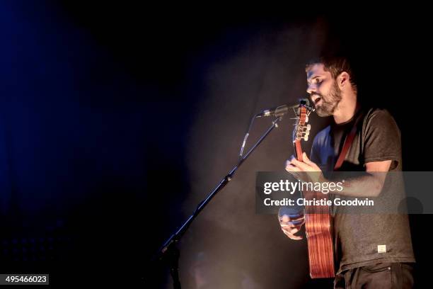 Nick Mulvey performs on stage at Brixton Academy on June 3, 2014 in London, United Kingdom.