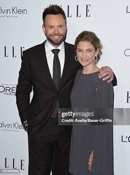 Host Joel McHale and Sarah Williams arrive at the 22nd Annual ELLE Women In Hollywood Awards at Four Seasons Hotel Los Angeles at Beverly Hills on...