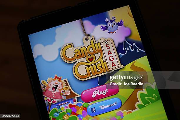 In this photo illustration, a Candy Crush game is seen on an iPad on November 3, 2015 in Miami, Florida. It was announced today that game maker...