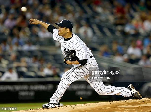 Hiroki Kuroda of the New York Yankees delivers a pitch in the first inning against the Oakland Athletics on June 3, 2014 at Yankee Stadium in the...