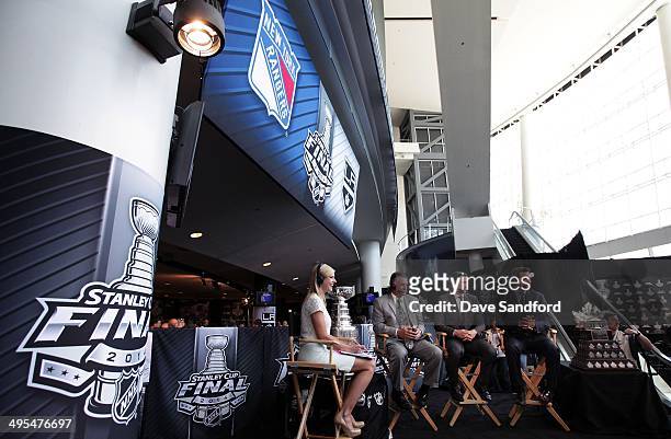 Kathryn Tappen, Barry Melrose, Mike Johnston and Martin Biron speak on set of the NHL Network during Media Day for the 2014 Stanley Cup Final at...