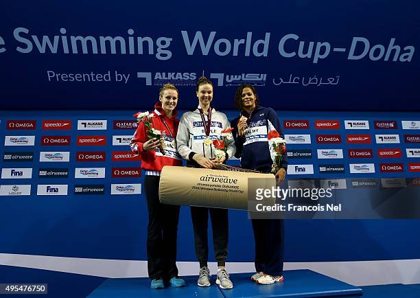Jaz Carlin of Great Britain, Lauren Boyle of New Zealand and Coralie Balmy of France celebrates on the podium after the Women's 400m Freestyle final...