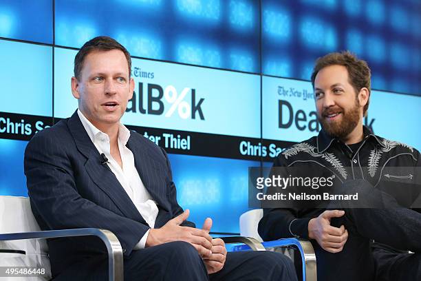 Partner at Founders Fund Peter Thiel and founder and chairman at Lowercase Capital Chris Sacca participate in a panel discussion at the New York...