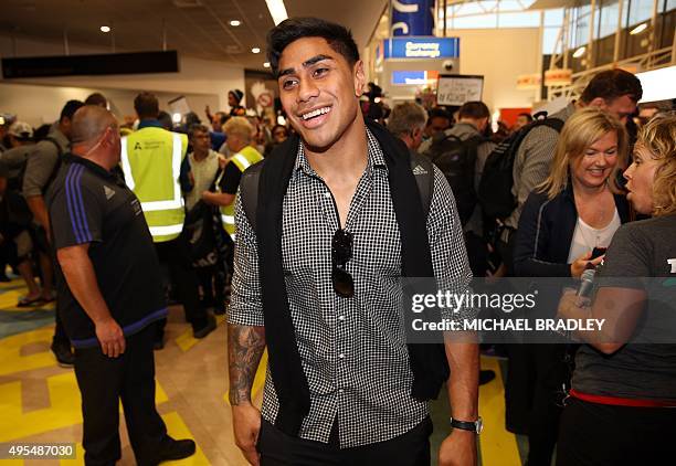 All Blacks Malakai Fekitoa arrives back home with the Rugby World Cup trophy at the Auckland Airport in Auckland on November 04, 2015. The New Zeland...