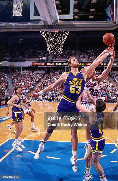Mark Eaton of the Utah Jazz rebounds against the Sacramento Kings circa 1990 at Arco Arena in Sacramento, California. NOTE TO USER: User expressly...