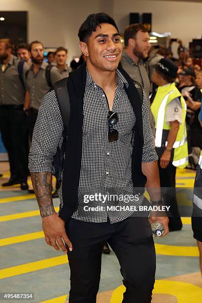 All Blacks Malakai Fekitoa arrives back home with the Rugby World Cup trophy at the Auckland Airport in Auckland on November 04, 2015. The New Zeland...