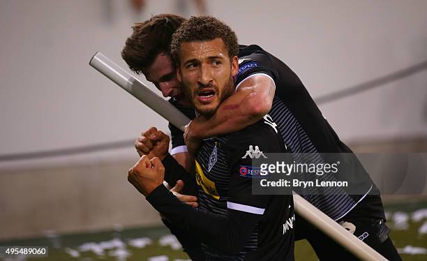 Fabian Johnson of Borussia Moenchengladbach celebrates with Havard Nordtveit as he scores their frist goal during the UEFA Champions League Group D...
