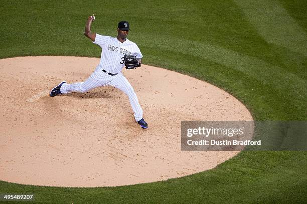 LaTroy Hawkins of the Colorado Rockies delivers a pitch in the ninth inning of a game against the Arizona Diamondbacks at Coors Field on June 3, 2014...