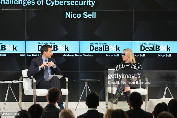 New York Times financial columnist Andrew Ross Sorkin participates in a panel discussion with co-founder and co-chairman of Wickr Nico Sell at the...