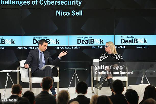 New York Times financial columnist Andrew Ross Sorkin participates in a panel discussion with co-founder and co-chairman of Wickr Nico Sell at the...