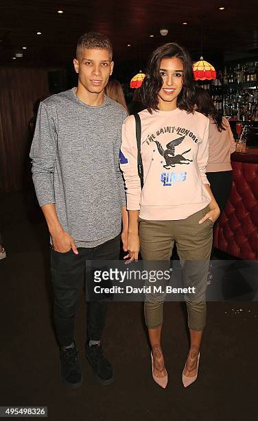 Chuck Achike and Ashley Sky attend the Shopbop event to celebrate an exclusive collaboration with Etre Cecile at All Star Lanes on November 3, 2015...
