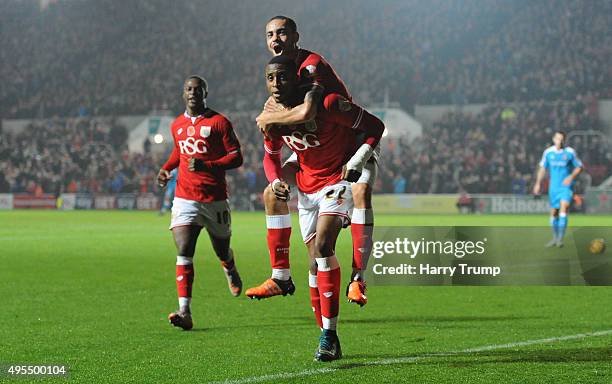 Jonathan Kodjia of Bristol City celebrates his sides goal with Derrick Williams of Bristol City on his shoulders during the Sky Bet Championship...