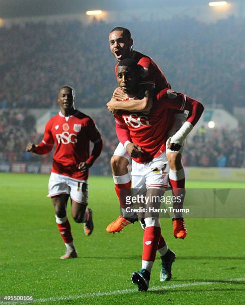 Jonathan Kodjia of Bristol City celebrates his sides goal with Derrick Williams of Bristol City on his shoulders during the Sky Bet Championship...
