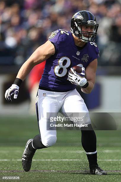 Tight end Nick Boyle of the Baltimore Ravens carries the ball in the first quarter of a game against the San Diego Chargers at M&T Bank Stadium on...