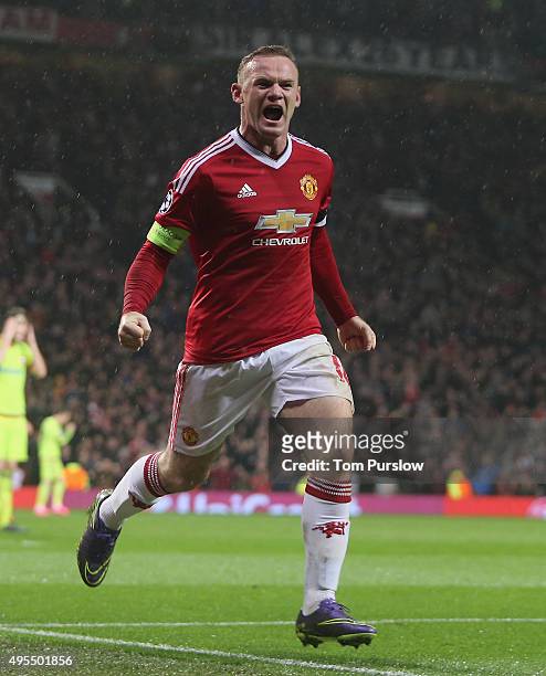 Wayne Rooney of Manchester United celebrates scoring their first goal during the UEFA Champions League match between Manchester United and CSKA...
