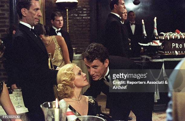 American actor James Woods listening to American actress Tuesday Weld whispering at his ear in the film Once Upon a Time in America. 1984