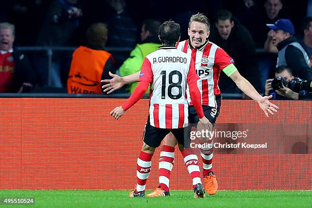 Luuk de Jong of Eindhoven celebrates the second goal with Andres Guardado of Eindhoven during the UEFA Champions League Group B match between PSV...