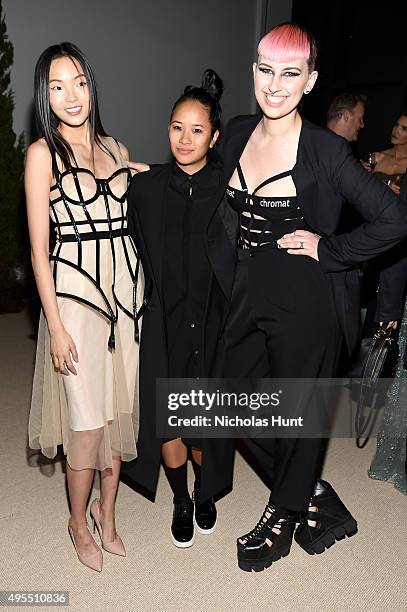 Model Zhao Wei Jing, Christine Tran, designer and finalist Becca McCharen of Chromat attend the 12th annual CFDA/Vogue Fashion Fund Awards at Spring...