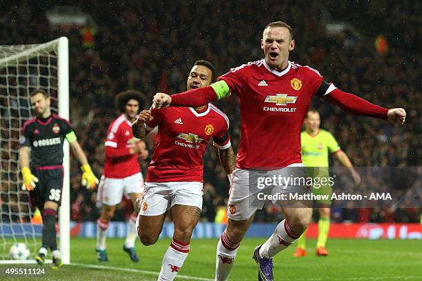 Wayne Rooney of Manchester United celebrates after scoring a goal to make it 1-0 during the UEFA Champions League match on November 3, 2015 in...