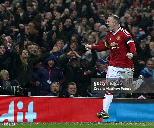 Wayne Rooney of Manchester United celebrates scoring their first goal during the UEFA Champions League match between Manchester United and CSKA...