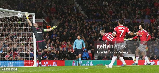 Wayne Rooney of Manchester United scores their first goal during the UEFA Champions League match between Manchester United and CSKA Moscow at Old...