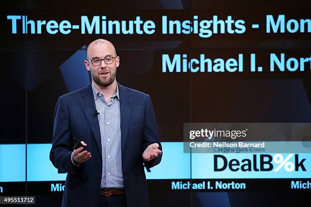 Harold M. Brierly Professor of Business Administration at the Harvard Business School Michael I. Norton speaks on stage at the New York Times 2015...