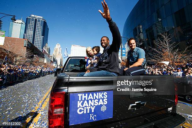 Lorenzo Cain of the Kansas City Royals waves to the crowd during a parade and celebration in honor of the Royals' World Series win on November 3,...