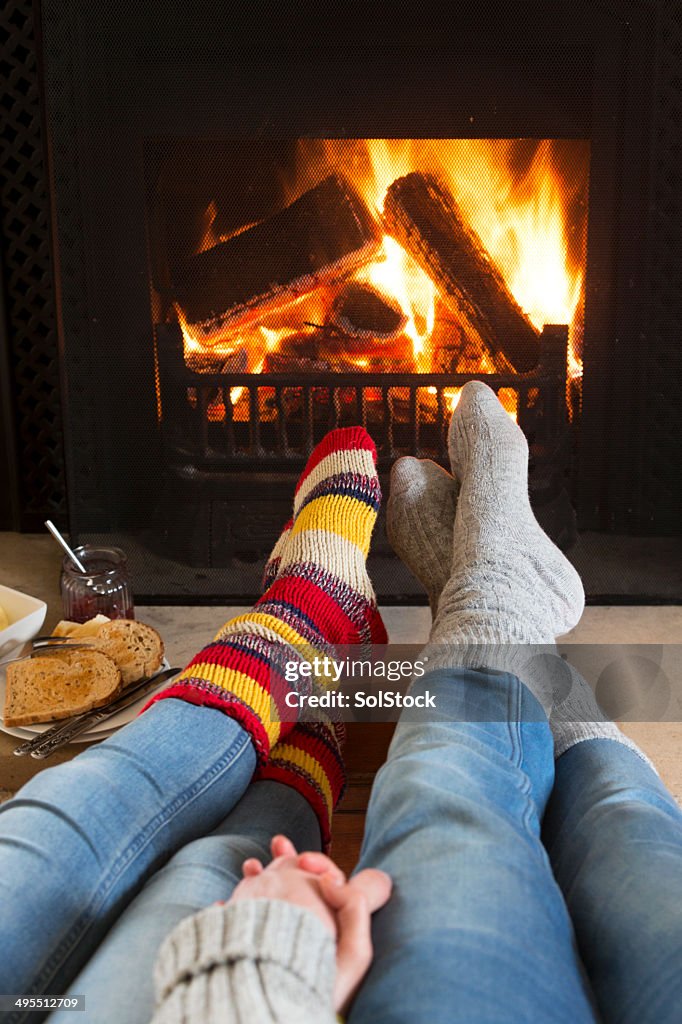 Warming Feet by the Fire