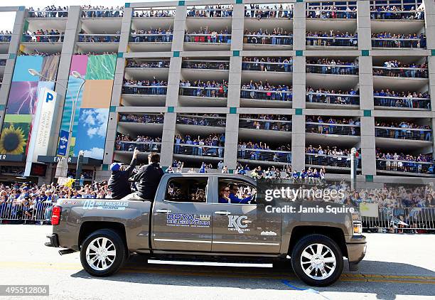 Mike Moustakas of the Kansas City Royals waves to the crowd during a parade and celebration in honor of the Royals' World Series win on November 3,...