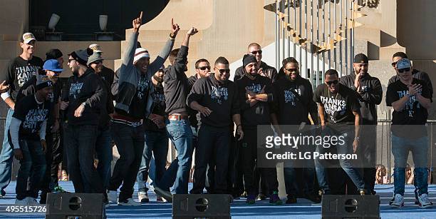 Royals celebrate on stage during the Kansas City Royals World Series parade celebration in downtown Kansas City on Tuesday, November 3, 2015 in...