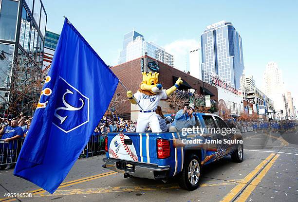 The Kansas City Royals' mascot Sluggerrr waves to the crowd during a parade and celebration in honor of the Royals' World Series win on November 3,...