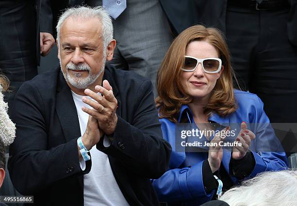 Francis Perrin and his wife Gersende Perrin attend Day 10 of the French Open 2014 held at Roland-Garros stadium on June 3, 2014 in Paris, France.