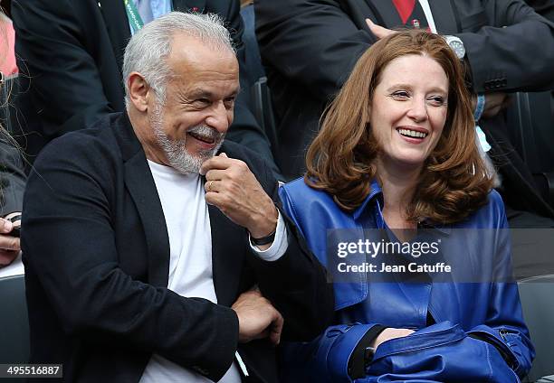 Francis Perrin and his wife Gersende Perrin attend Day 10 of the French Open 2014 held at Roland-Garros stadium on June 3, 2014 in Paris, France.